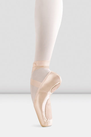 Foot in Bloch pointe shoe showing the ribbons.
